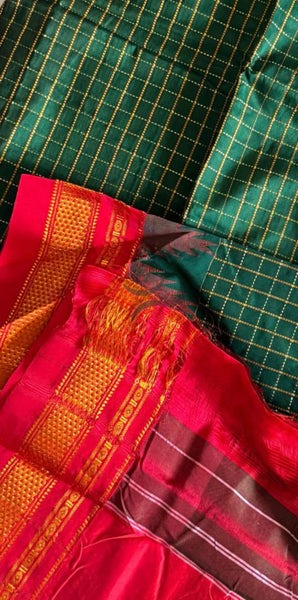 Green checkered Gadwal mercerised cotton saree with contrasting red temple border and pallu.