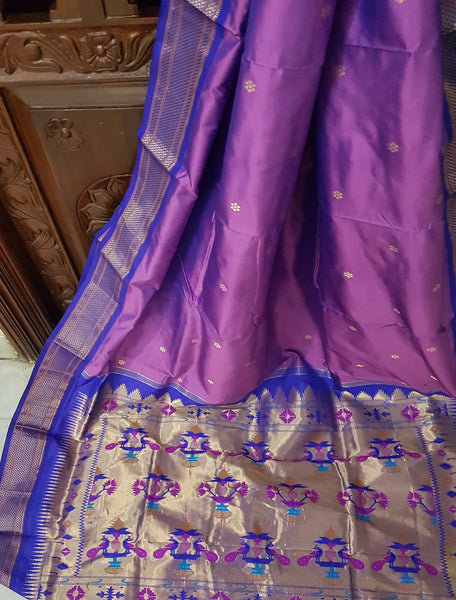 Purple handwoven silk Paithani with traditional peocock motif