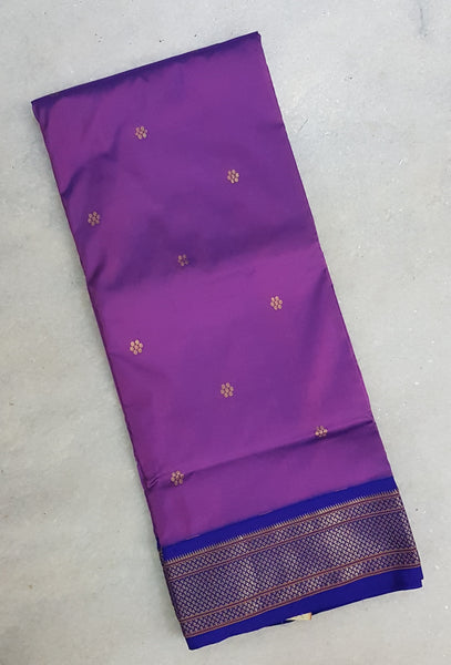 Purple handwoven silk Paithani with traditional peocock motif