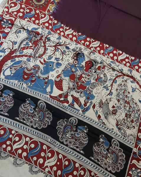 Chennur silk kalamkari with intricate peacock and dancing figures on pallu