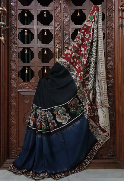 Chennur silk kalamkari half and half with intricate peacock motif on pallu and border.