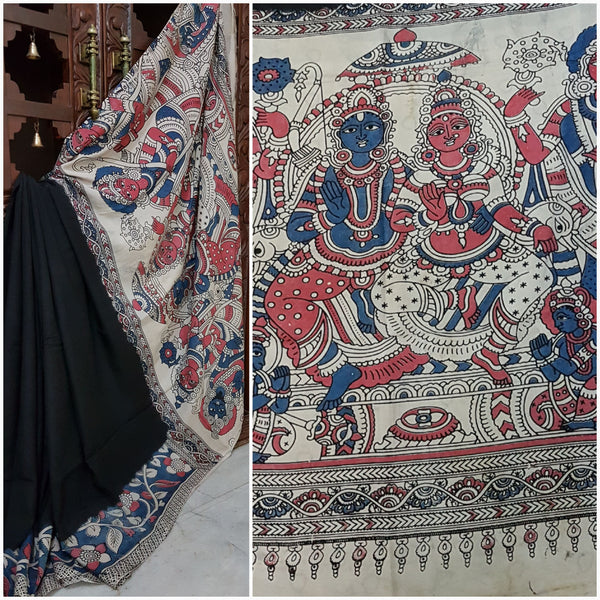 Black chennur silk kalamkari with intricate god and goddess motif on pallu.
