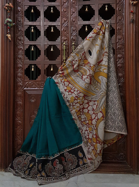 Green mul cotton kalamkari with with musical instrument motifs on pallu