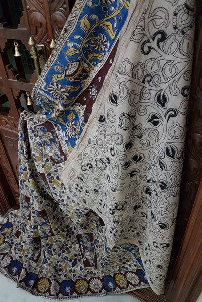 Mul cotton kalamkari with intricate wedding procession motif on pallu.