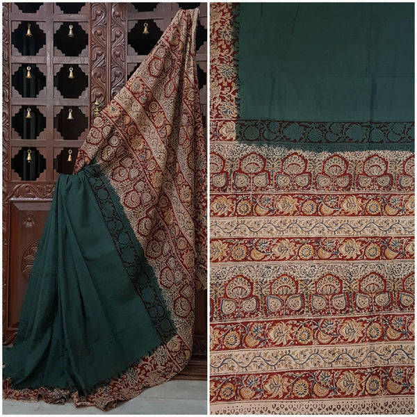 Green mul cotton kalamkari with floral motif on pallu and border.