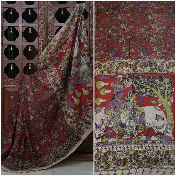 Maroon cotton kalamkari with floral motif on body and intricate Radha Krishna motif on pallu.