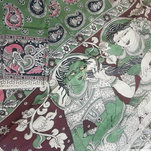 Green handloom chennur silk kalamkari saree with contrasting blouse piece.