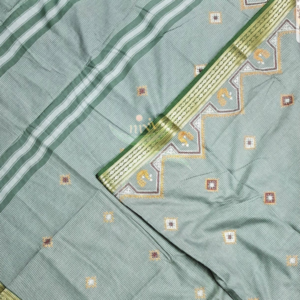 Mint green kota cotton with traditional peacock motif kasuti embroidery