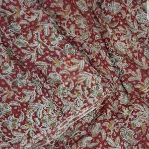 Red chennur silk kalamkari running material with floral motifs