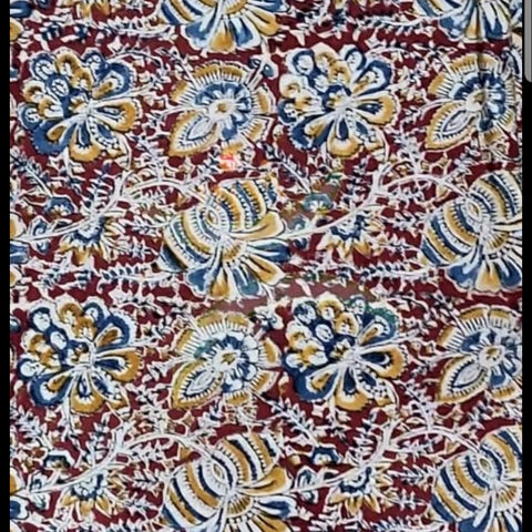 Red handloom cotton kalamkari fabric with floral motifs