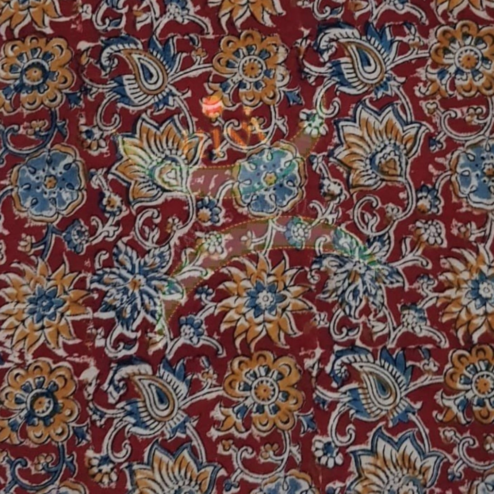 Red handloom cotton kalamkari fabric with floral motifs