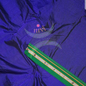 Royal blue  Khun/khana running material with green border. Width of the fabric is 36 inches.