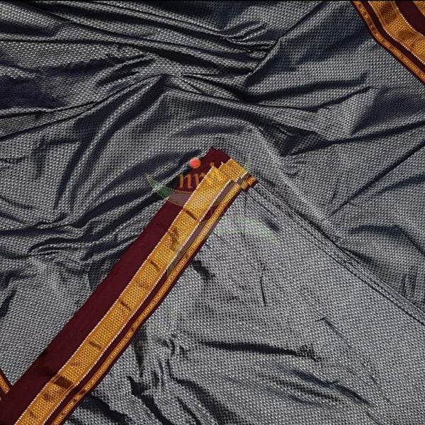 Dark grey Khun/khana running material with maroon border. Width of the fabric is 36 inches.