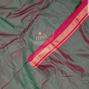 Two tone green  Khun/khana running material with red border. Width of the fabric is 36 inches.
