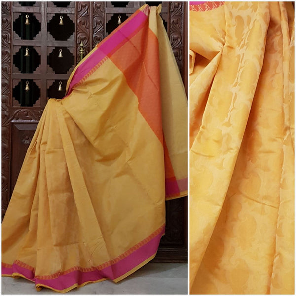 Yellow pink sico Benaras with allover Paisley motif and suble pink zari pallu.