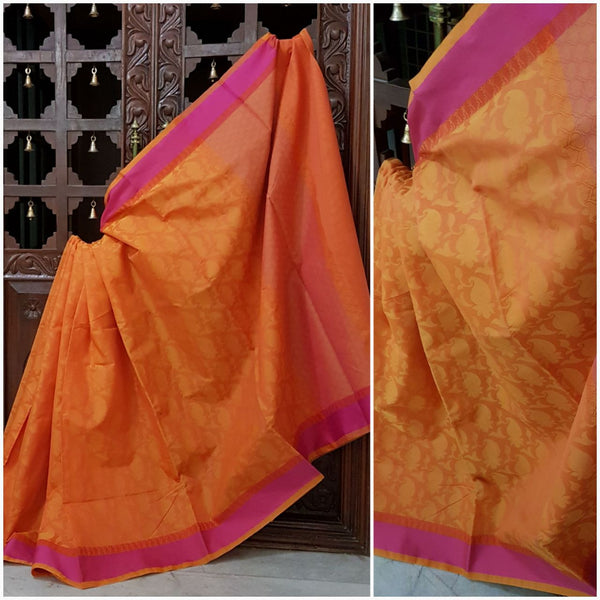Orange pink sico Benaras with allover Paisley motif and suble pink zari pallu.