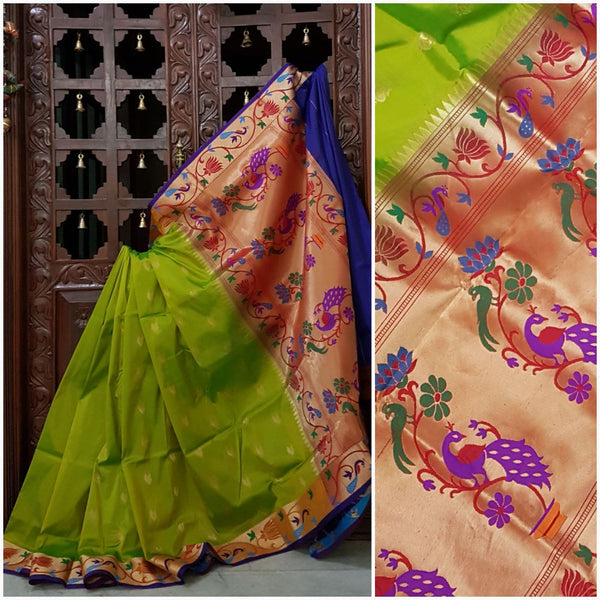 Green paithani with traditional peacock motif and contrast blue pallu and border.