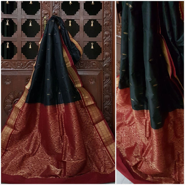 Black and Maroon handwoven kanjivaram with Traditionally woven floral pallu and border.saree is with floral booties all over body.