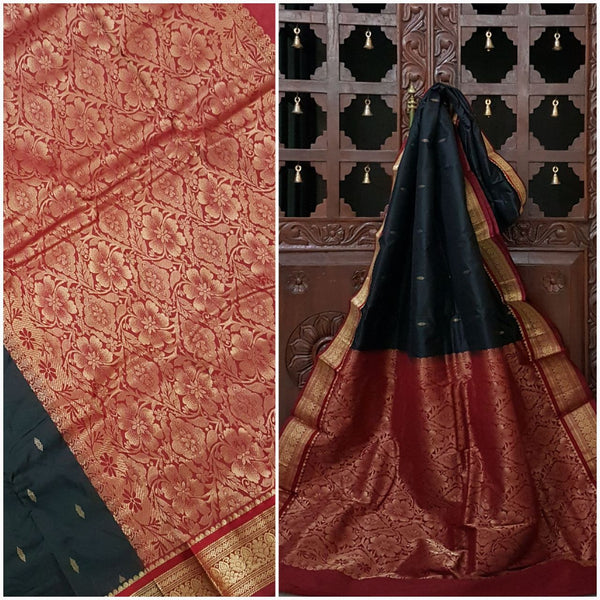 Black and Maroon handwoven kanjivaram with Traditionally woven floral pallu and border.saree is with floral booties all over body.