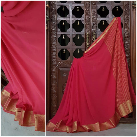 Pink crepe art silk with zari border.