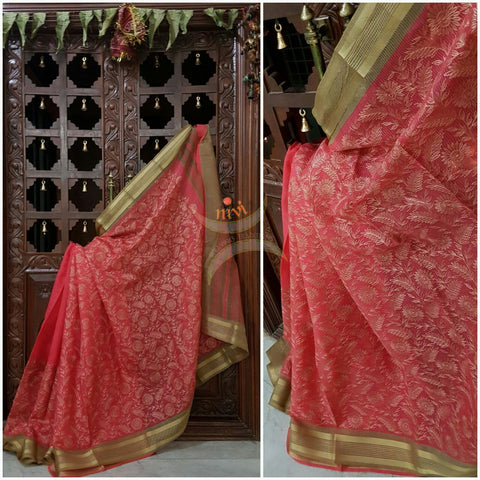 Red organza with all over embroidery and contrasting border