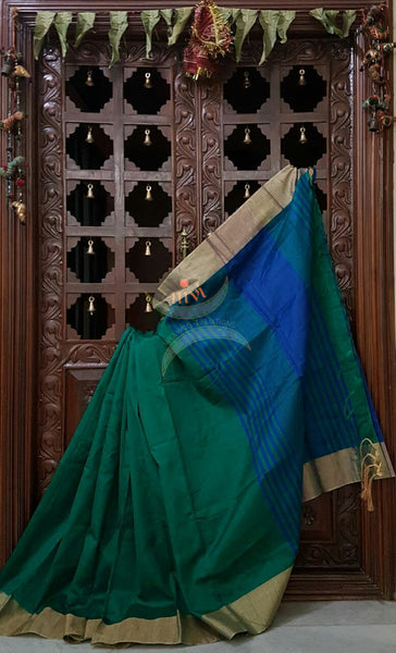 Bottle green art silk dupion with contrasting royal blue pallu and blouse piece