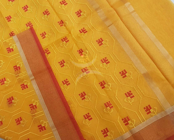 Yellow kota cotton with all over embroidery and contrasting red border