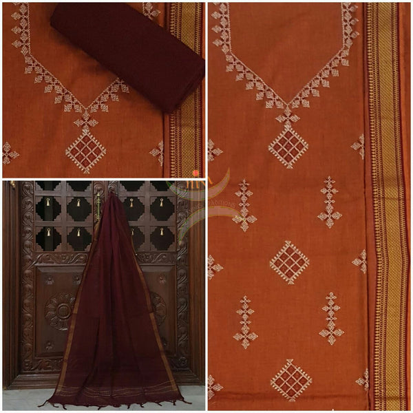Rust orange kasuti embroidered mangalgiri cotton top with zari border and plain contrasting maroon mangalgiri cotton salwar and dupatta