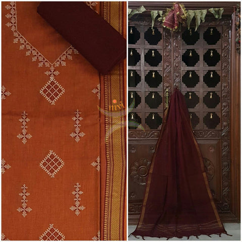 Rust orange kasuti embroidered mangalgiri cotton top with zari border and plain contrasting maroon mangalgiri cotton salwar and dupatta