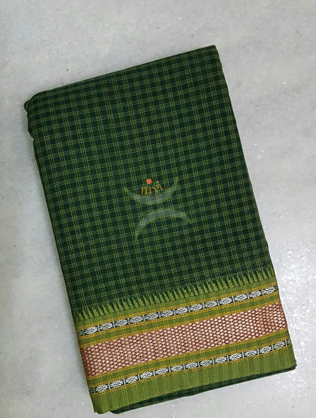 Kota cotton checks with traditional border and pallu. Saree comes with running blouse