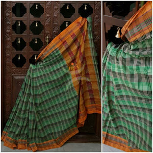 South cotton checks with traditional striped pallu. Saree comes with running blouse piece