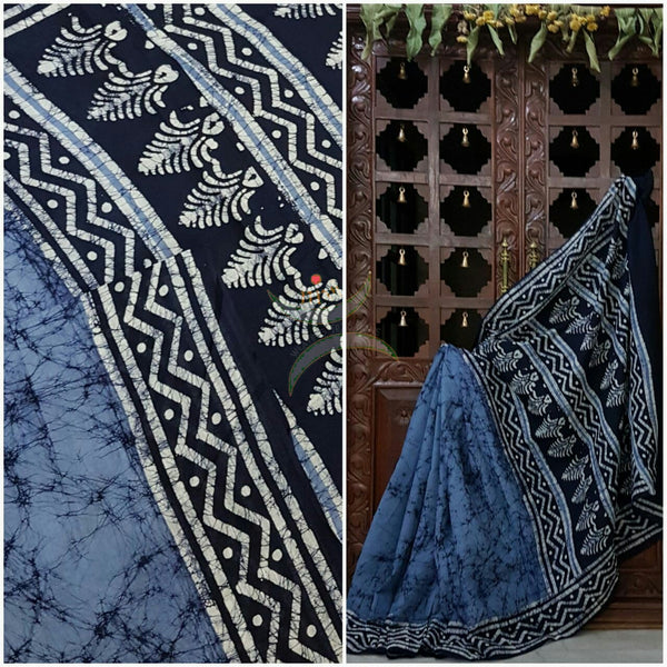 Blue handloom Mul Cotton Batik saree with abstract motif on contrasting navy blue border and pallu
