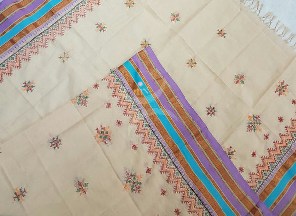 Off white with pink blue kota cotton Kasuti embroidered with Traditional geometric motifs.