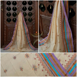 Off white with pink blue kota cotton Kasuti embroidered with Traditional geometric motifs.