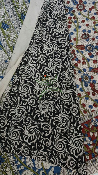 Off white chennur silk kalamkari with floral motif all over the body and peacock and floral motif on border and pallu.