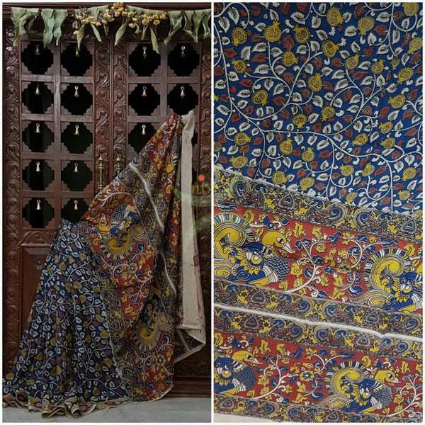 Blue chennur silk kalamkari with all over floral motif on body and border and intricate peacock motif on pallu.