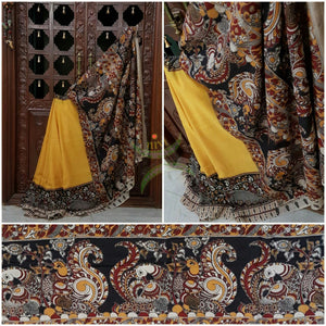 Yellow dye on dye chennur silk kalamkari with peacock motif on border and pallu.