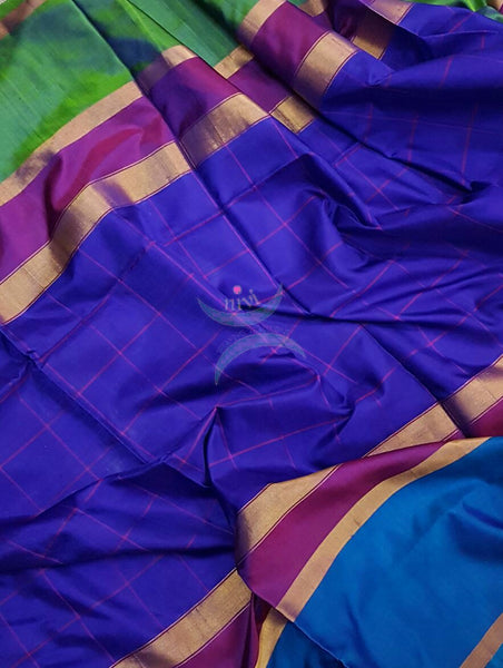 Royal blue chequered pure silk uppada with multi coloured woven border and contrasting pink pallu and blouse