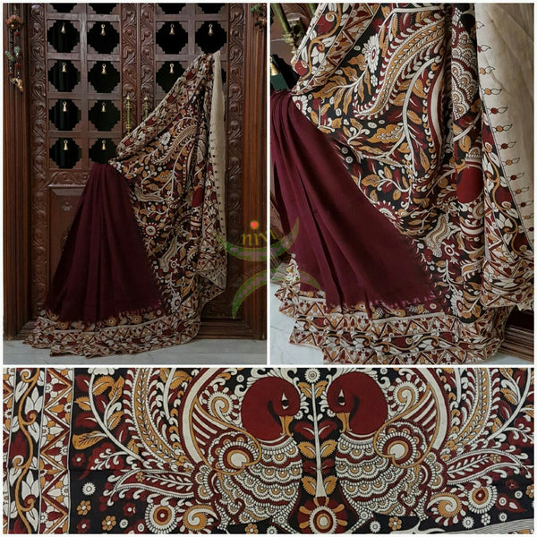 Maroon dye on dye chennur silk kalamkari with intricate peacock motif on pallu and abstract motif on border.