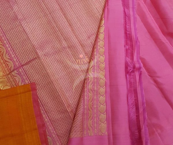 Orange Handloom pure silk linen with tree motif on body and brocade woven pink pallu and plain pink blouse.