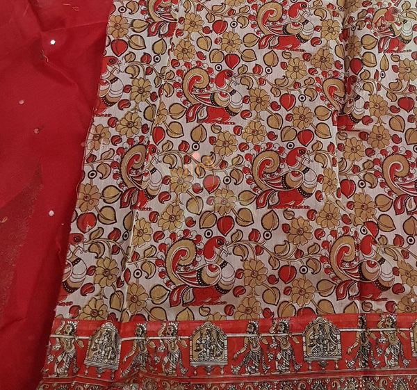 Red supernet saree with kalamkari motif of wedding scene applique on border, mirror work all over body and kalamkari blouse.