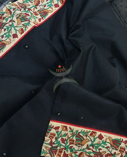 Black supernet saree with kalamkari floral motif applique on border, mirror work all over body and kalamkari blouse.