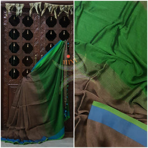 Grey Handloom 80s count Linen saree with contrasting blue green border and green pallu. 