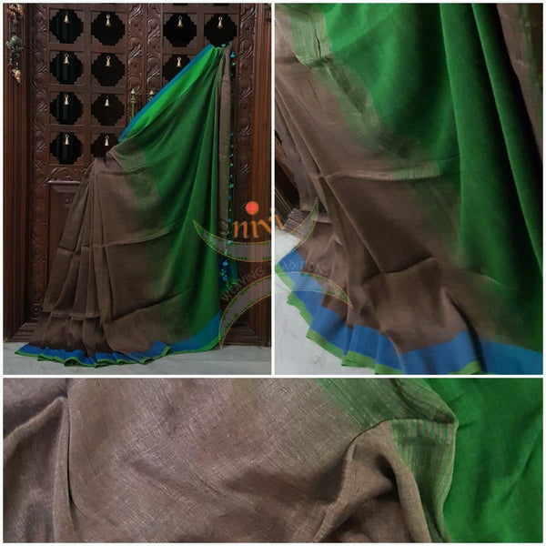 Grey Handloom 80s count Linen saree with contrasting blue green border and green pallu. 