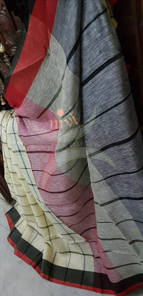 Off white Handloom 100s count Linen saree woven with chequered pattern and contrasting black red border and pallu. Saree comes with striped grey blouse. 