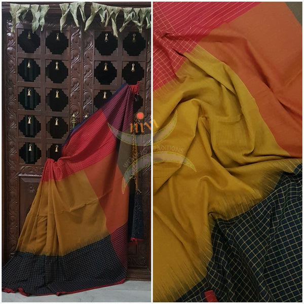 Mustard handloom cotton saree with Ganga jamuna chequared border and a contrast pallu