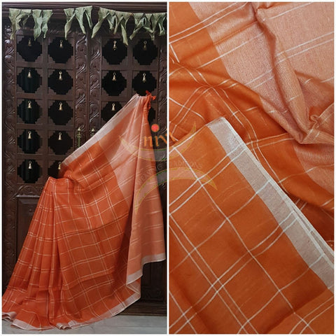 Orange Handloom 100s count Linen saree woven with chequered pattern and contrasting silver border and pallu.