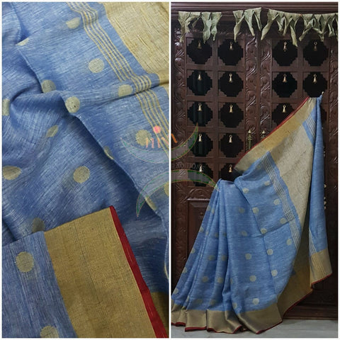 Blue with gold Handloom 100s count Linen saree with woven booties all over the saree and gold pallu.