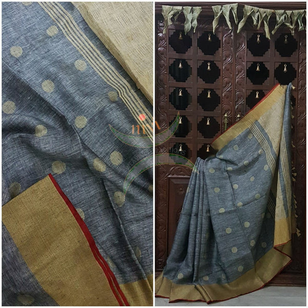Grey with gold Handloom 100s count Linen saree with woven booties all over the saree and gold pallu.