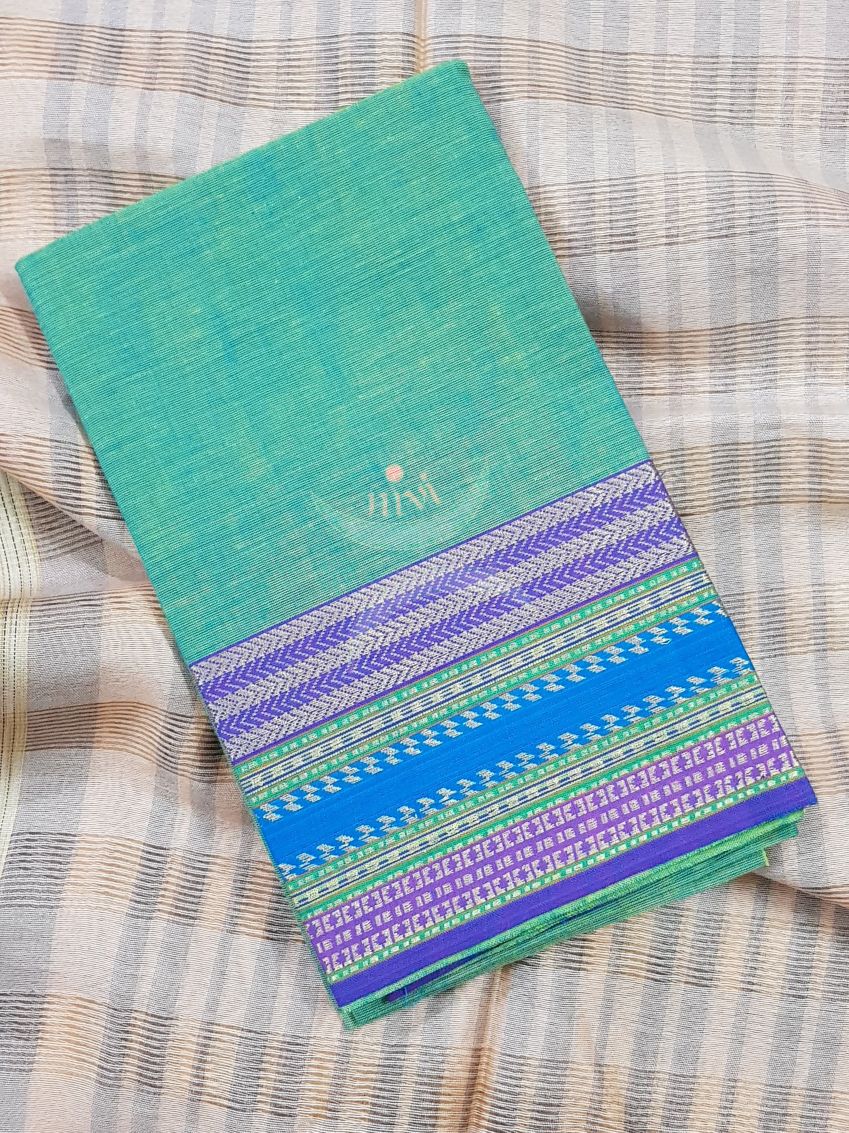 Sea green with blue Mangalgiri pure cotton blouse piece with traditional woven border. The blouse comes with 42 inches by  width and length up to 1mt.